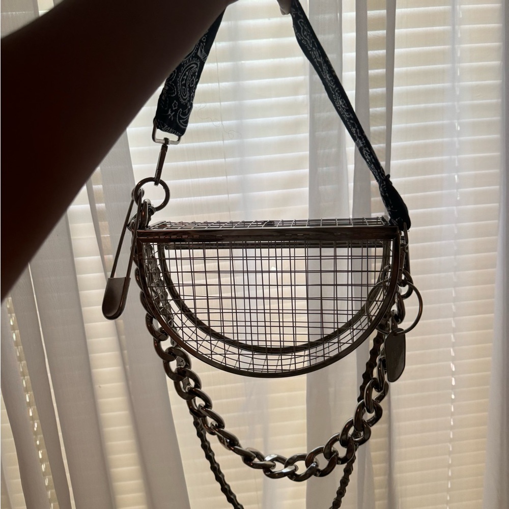Black and silver chain purse with a unique design